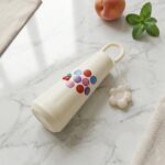 500ml Portable Glass Water Bottle with Smile Face Design and Cherry Charm