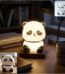 Cute mini panda night light lamp with soft warm LED glow for kids bedroom bedside table